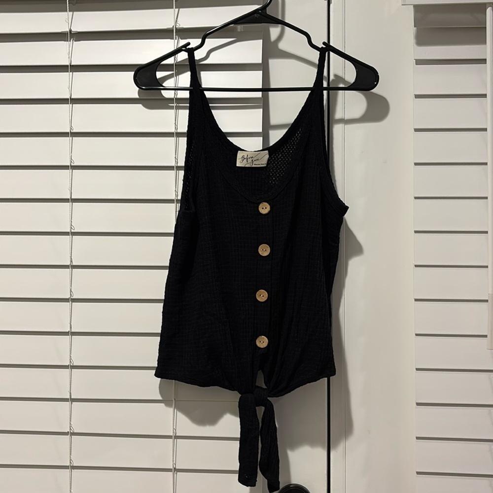 Knit button top
Size small 
Black in color